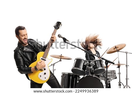 Rock band performing with a female drummer and a male guitairst isolated on white background