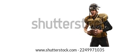 Champion. Man, american football player in uniform posing with ball over white studio background. Concept of sport, movement, achievements, competition, hobby. Copy space for ad. Banner, flyer
