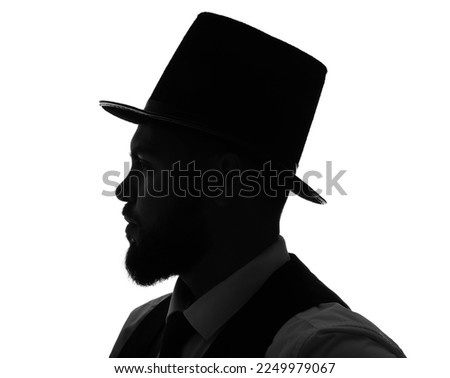 Silhouette of male magician on white background, closeup