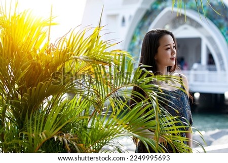 Beautiful Asian girl by the beach in Malaysia