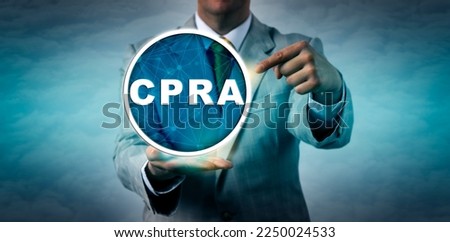 Unrecognizable business manager pointing at a CPRA icon signifying the California Privacy Rights Act. Business and technology metaphor for data privacy, compliance and consumer rights legislation.