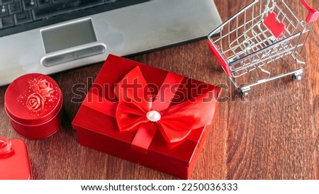 Online sell of gift boxes or merchandise boxes Black Friday sale elements composed on black background