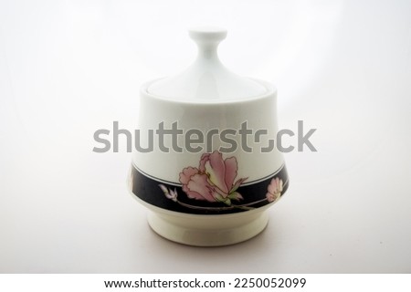 Patterned ceramic glass with white background