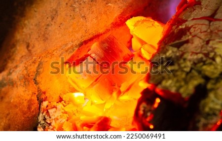 Fire in the fireplace. The illuminated area around the fire creates its own small zone In the firelight, it's easy to forget about everything that surrounds you (except your interlocutor, of course)