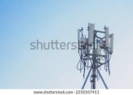 The top of telecommunication tower of 4G and 5G cellular on the station 4G and 5G radio network telecommunication equipment for broadcast network and signal with radio modules and smart antennas Royalty-Free Stock Photo #2250107413