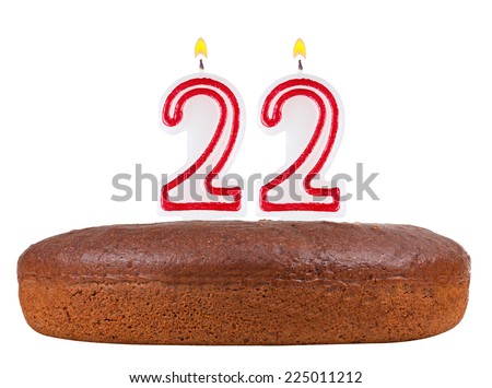 birthday cake with candles number 22 isolated on white background