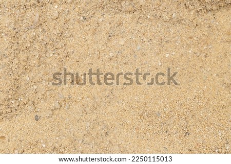 general construction sand It is sand dug from rivers or seashores. background image of grains of sand