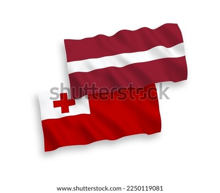 National vector fabric wave flags of Latvia and Kingdom of Tonga isolated on white background. 1 to 2 proportion.