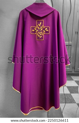 Purple chasuble of the priest inside the sacristy of a Catholic church