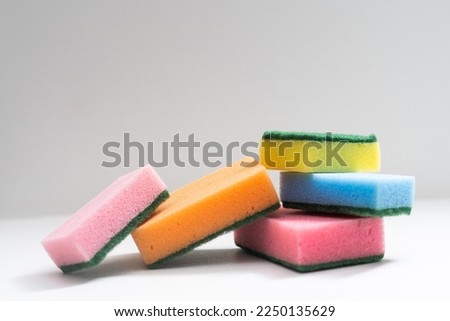 cleaning sponges on a white background Royalty-Free Stock Photo #2250135629