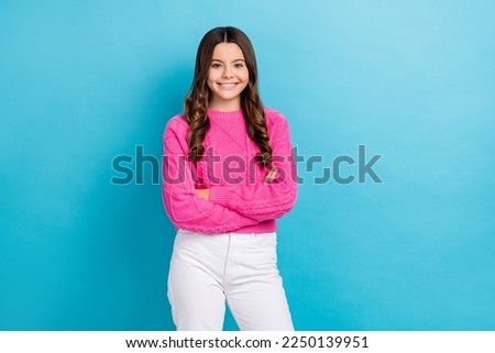 Photo of pretty adorable positive lady wear bright clothes like her new outfit enjoy quality isolated on blue color background