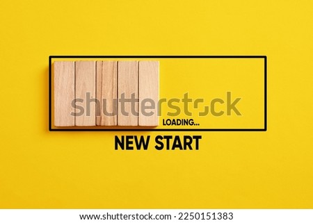Waiting or preparing for a new start in business career or life. New start loading progress bar on yellow background. Royalty-Free Stock Photo #2250151383