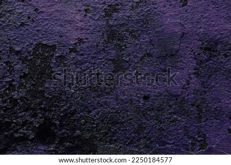 Old dark background. Dark vintage violet distressed wall texture. Grunge background.