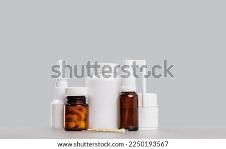 pharmacy order delivery banner. prescription drugs and over the counter medication. Pills jar and spray mockup vial containers on grey. Drugstore shopping copy space Royalty-Free Stock Photo #2250193567