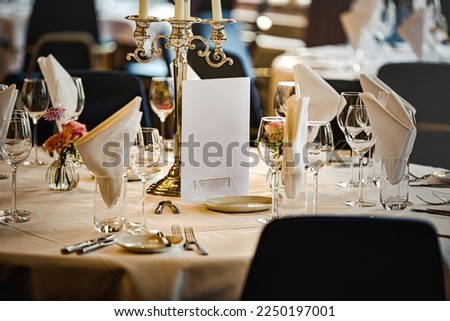 prepared luxurious table at expensive restaurant Royalty-Free Stock Photo #2250197001