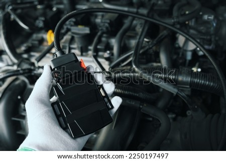 chip tuning box for car engine Royalty-Free Stock Photo #2250197497