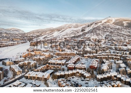 Panorama view of Steamboat Springs, Colorado mountain skiing and snowboarding resort town with Mt. Werner landscape in background   Royalty-Free Stock Photo #2250202561