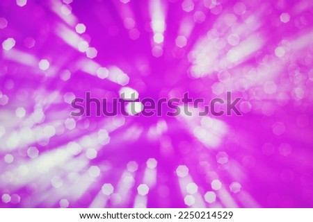 Blurred abstract purple background with bokeh