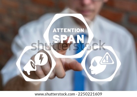Concept of attention span. Mental psychological health. Businessman using virtual touchscreen push attention span inscription. Royalty-Free Stock Photo #2250221609
