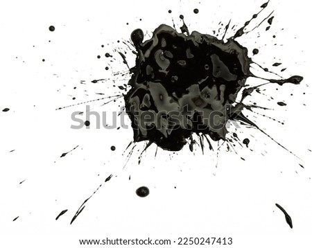 Closeup of shapeless black ink blot on white background.. Royalty-Free Stock Photo #2250247413