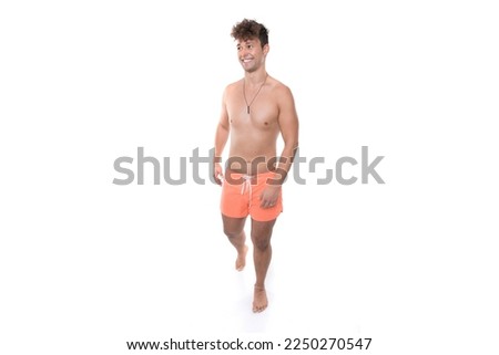 mockup of man apparel with orange swim trunk walk and look to side chunky without sixpack   Royalty-Free Stock Photo #2250270547