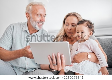 Family, tablet and baby with grandparents on sofa in home on social media, streaming movie or educational app. Relax, love and grandpa, grandma and infant or child with touchscreen tech for cartoons.