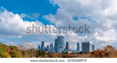 Houston skylines with blue sky and white clouds