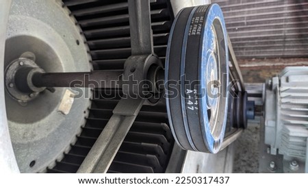 V belt Pulley on the Electrical Motor Ventilation Air Handling Unit. Royalty-Free Stock Photo #2250317437