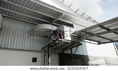 Air Handling Unit Instalation on the Building Factory.  Royalty-Free Stock Photo #2250324317
