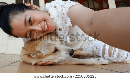 Asian woman selfie with dog,Self portrait