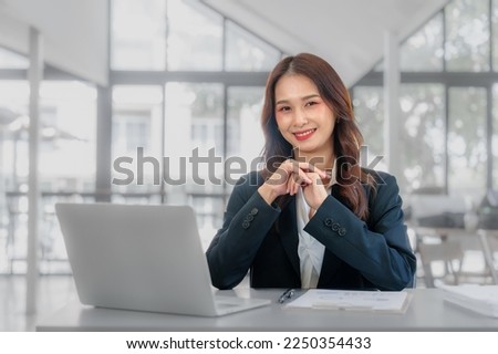 Stock market trader business woman asian people working at business office workplace fund loan data. Smile happy trust in HR job.