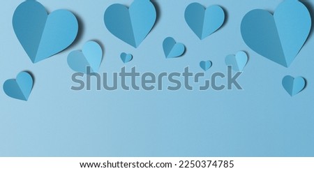 Light blue heart confetti set on light blue confetti background. Valentine's Day