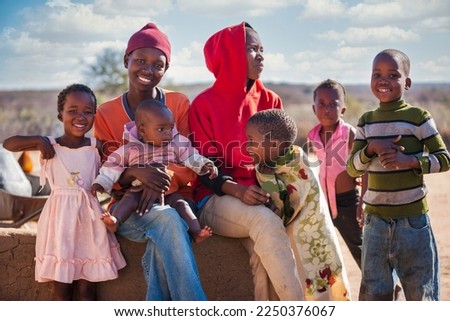 portrait of an large african family in the village Royalty-Free Stock Photo #2250376067