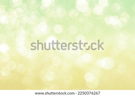 BLURRED LIGHTS BACKGROUND, SPRING BOKEH BACKDROP, SHINY CIRCLES TEXTURE, GLITTERING LIGHTS ON YELLOW GREEN GRADIENT Royalty-Free Stock Photo #2250376267
