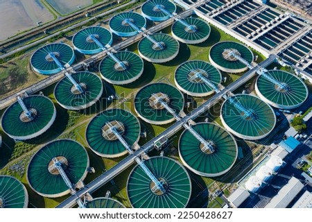 Aerial View of Drinking-Water Treatment. Microbiology of drinking water production and distribution, water treatment plant. Recirculation solid contact clarifier sedimentation tank. Royalty-Free Stock Photo #2250428627