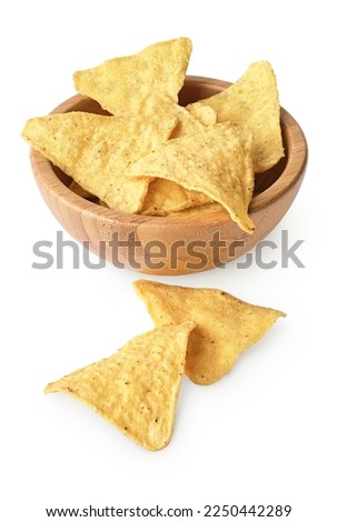 Corn chips in wooden bowl, isolated on white background
