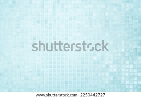 Blue light ceramic wall checkered and floor tiles mosaic background in bathroom and kitchen. Design pattern geometric with grid wallpaper texture decoration. Simple seamless abstract surface clean. Royalty-Free Stock Photo #2250442727