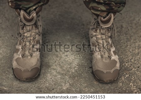 Close up picture of soldiers feet in boots