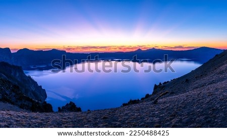 Purple sunset at Crater Lake at Cloudcap Overlook at Redcloud Cliff in Crater Lake National Park in Oregon