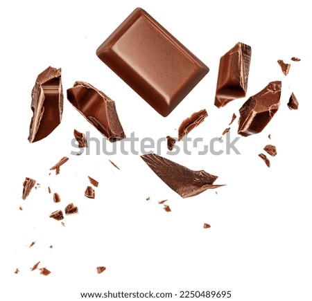  Levitating milk chocolate chunks isolated on white background. Flying Chocolate pieces, shavings and cocoa crumbs Top view. Flat lay
 Royalty-Free Stock Photo #2250489695