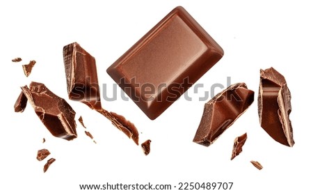  Levitating milk chocolate chunks isolated on white background. Flying Chocolate pieces, shavings and cocoa crumbs Top view. Flat lay
 Royalty-Free Stock Photo #2250489707