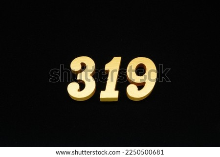 Image title: Golden Arabic numerals Image description: Made from 1cm thick wood painted in gold on a black background, looks like a 3D image, but not from a 3D illustration or 3D rendering program.
