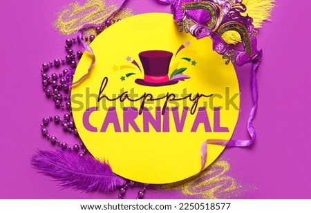 Greeting card with text HAPPY CARNIVAL and bright decor on purple background