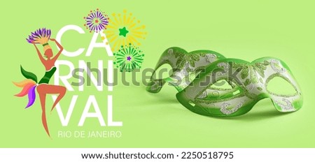 Beautiful carnival masks on green background
