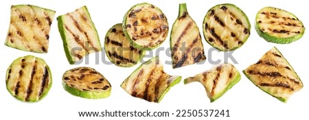 Grilled zucchini slices isolated on white background. Collection with clipping path. Royalty-Free Stock Photo #2250537241