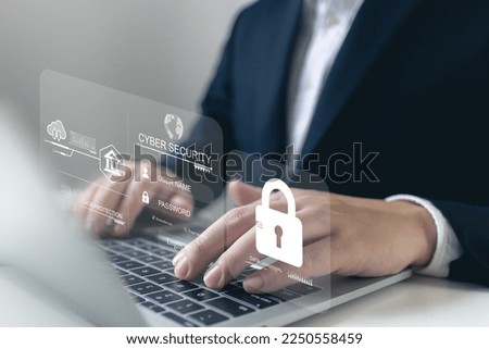 User typing login and password on laptop with virtual interfaces icons,Lock icon and internet network security technology,Cyber security concept,cybersecurity, Business, technology and networking.
