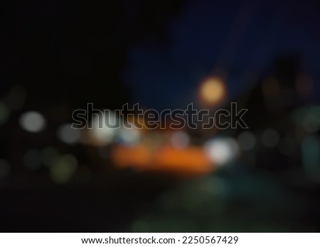 Defocused image of a road with lights anywhere