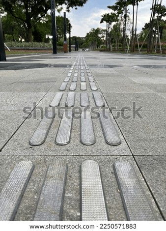 Pedestrian area on the train station for blind people