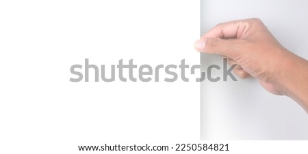 Hands holding paper blank for a letter paper