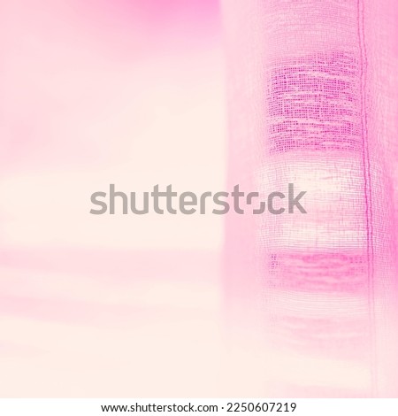 Close-up of indoor window curtains in warm soft pastel colors and tones for abstract retro-style backgrounds with space for text and design